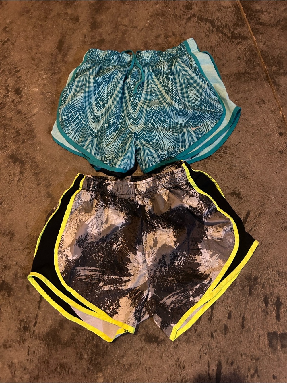 Nike Women’s Blue Patterned and Black Running Shorts – Set of 2
